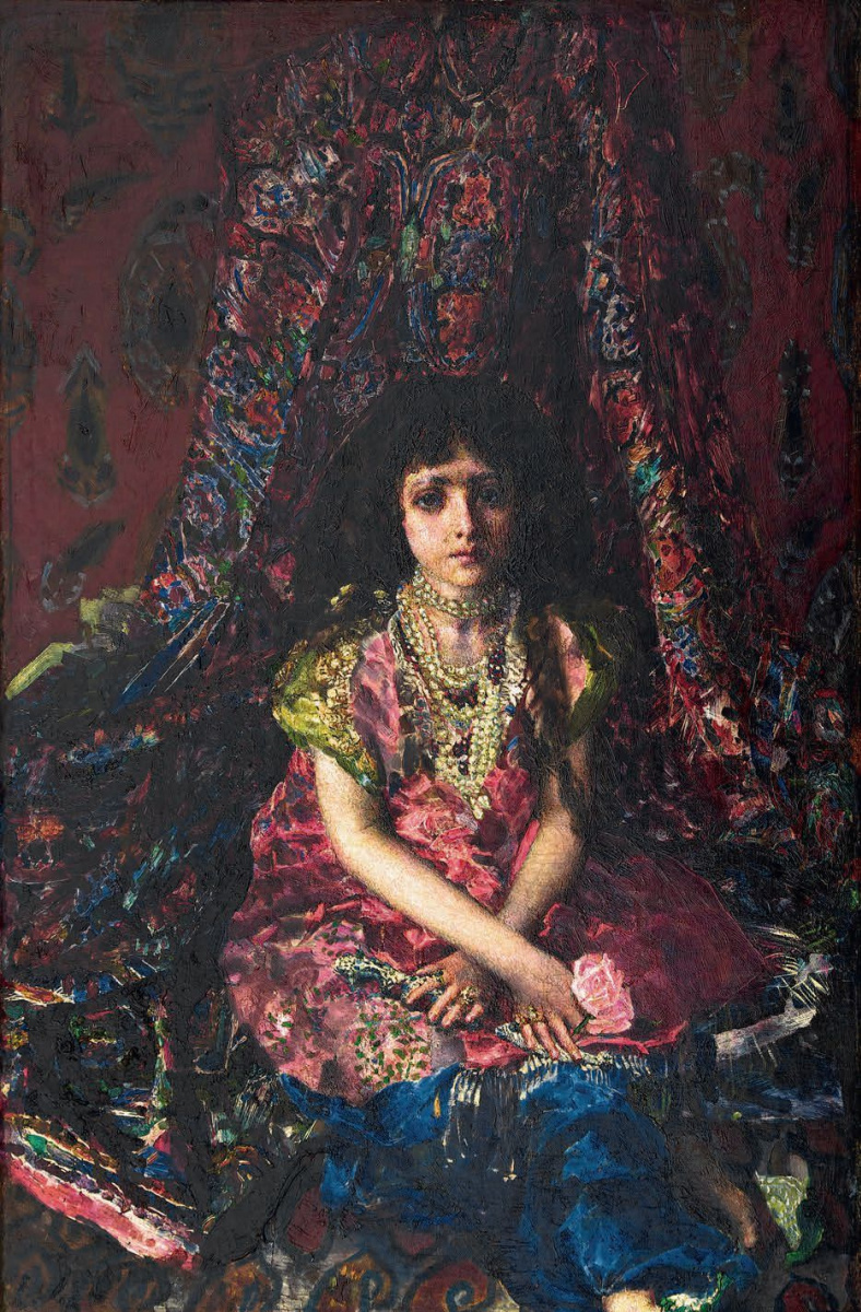 Девочка на фоне персидского ковра