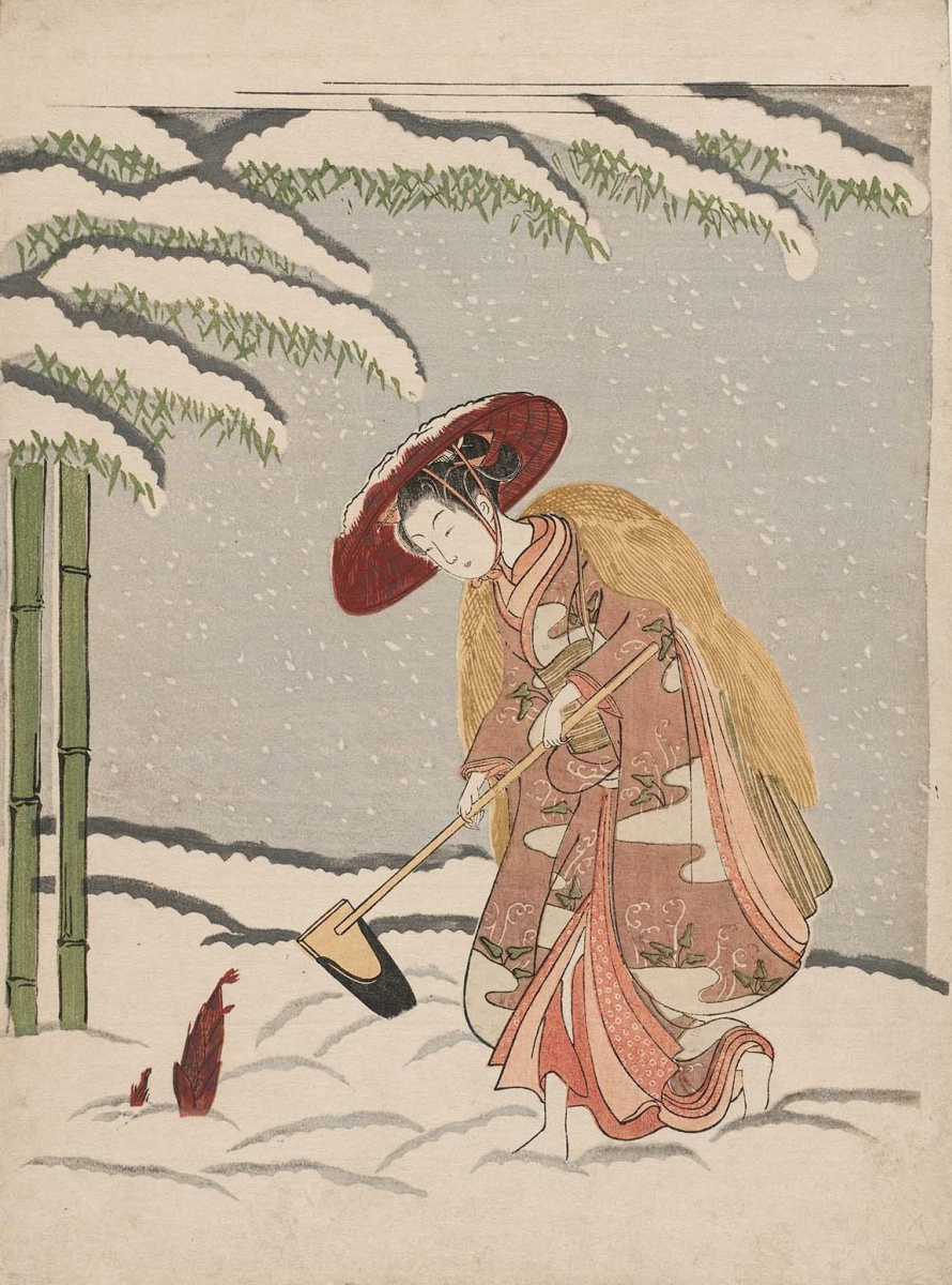 Женщина выкапывает бамбуковые побеги из снега