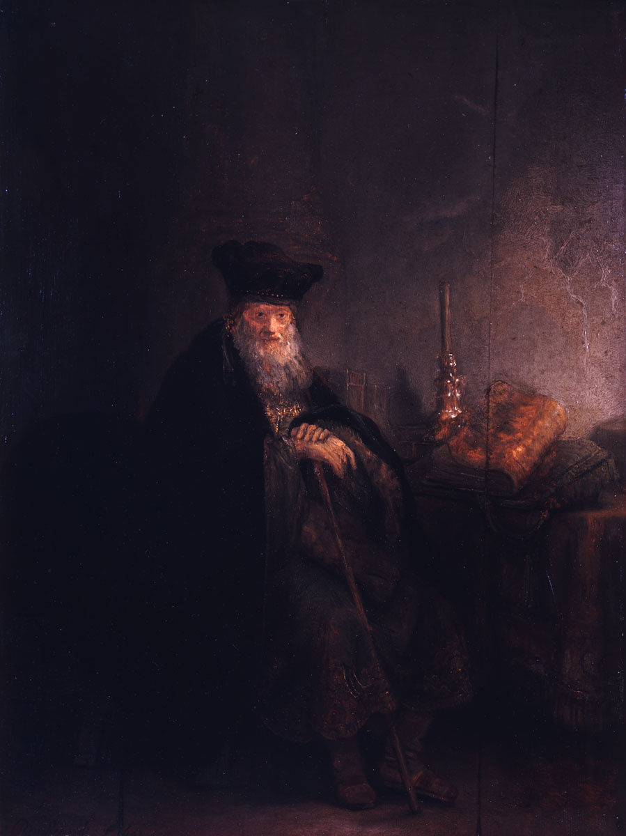 Рембрандт Харменс ван Рейн. Учёный у стола с книгами и подсвечником (Старый раввин)
