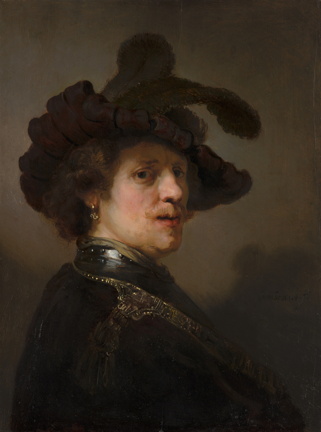 portrait of a man in a beret with a feather