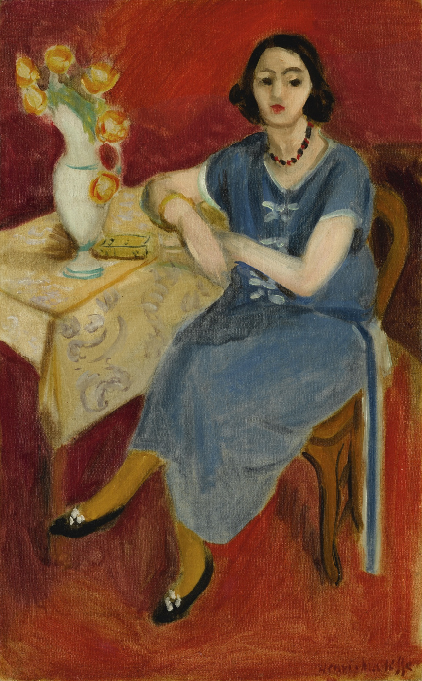 Анри Матисс. Женщина в голубом у стола на красном фоне